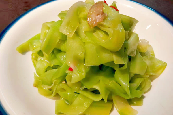 油菜花旁老柴房 乡土菜